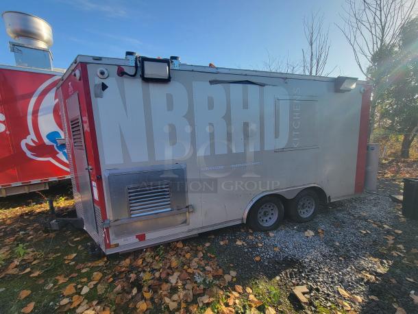 2019 Anvil 16' tandem axle food trailer, "NBRHD KITCHENS" branding. Requires restoration; internal damage from grease fire. VIN: 7FYBE1624KD009163.