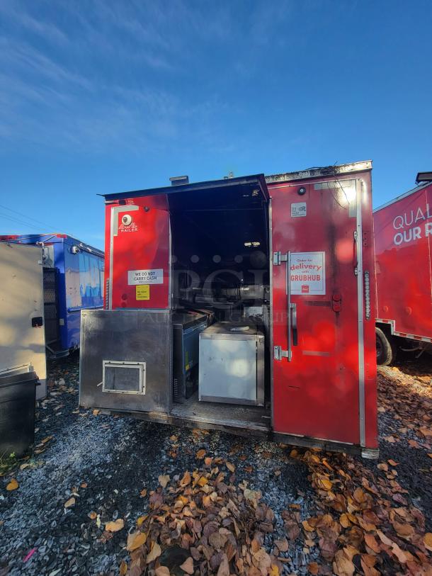 Red 2019 Anvil 16' Tandem Axle Food Trailer, condition: damaged from grease fire, needs full restoration. Displaying "NBRHD KITCHENS" branding.