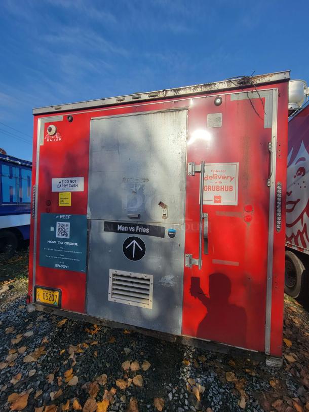 2019 Anvil 16' food trailer, red exterior, visible damage, stickers: Grubhub, QR code. Restoration project; VIN 7FYBE1624KD009163.