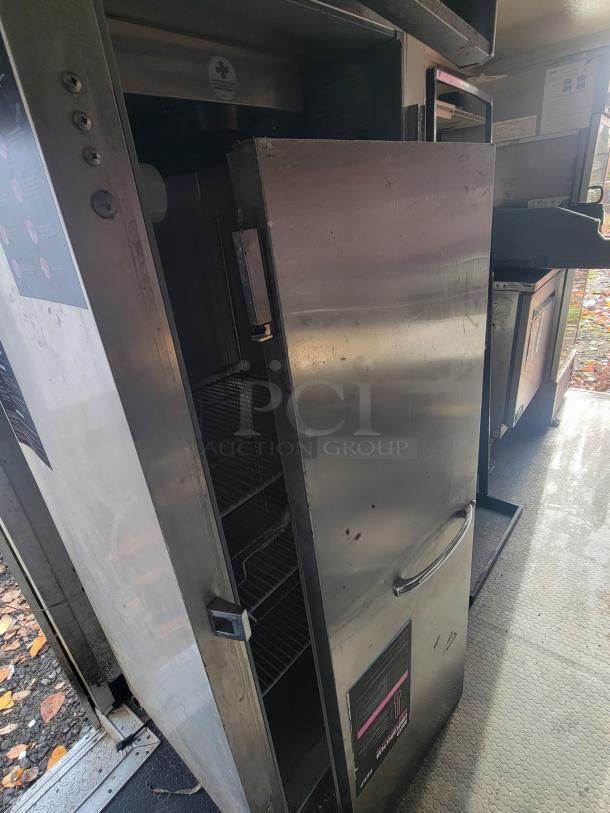 2020 16' Diamond Cargo Food Trailer interior showing professional-grade stainless steel equipment and shelving.