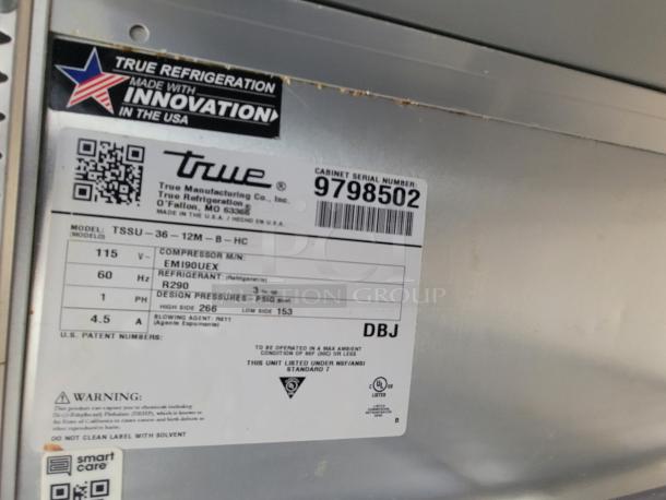 True Refrigeration label with model TSSU-36-12M-B-HC, serial number 9798502. Features 115V, R290 refrigerant. Made in USA.