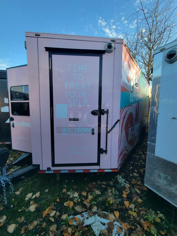 Pink SDG 20' mobile retail trailer with "Time to Treat Yourself" and "goodees provisions" logos, ideal for food/beverage sales.