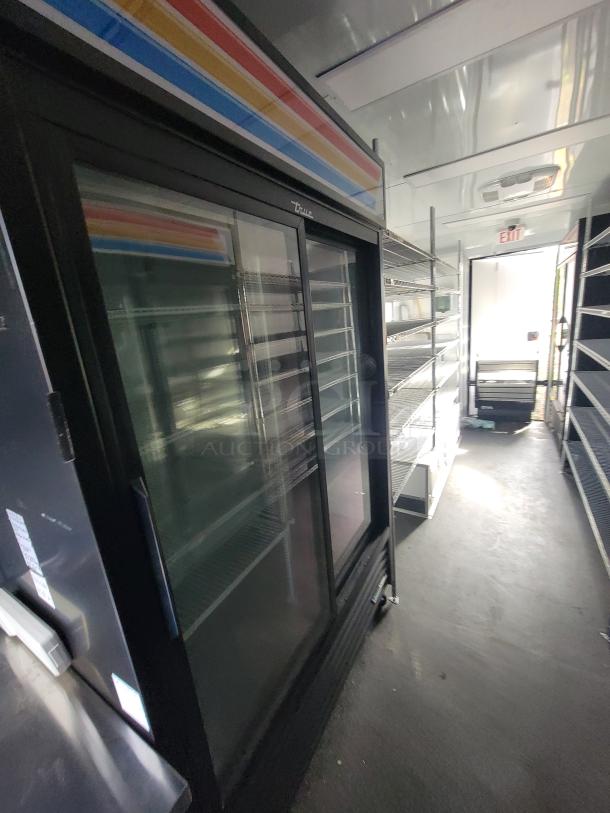 2021 SDG 20' Mobile Market Trailer interior with True refrigerators, shelving, and prep area for high-volume sales.