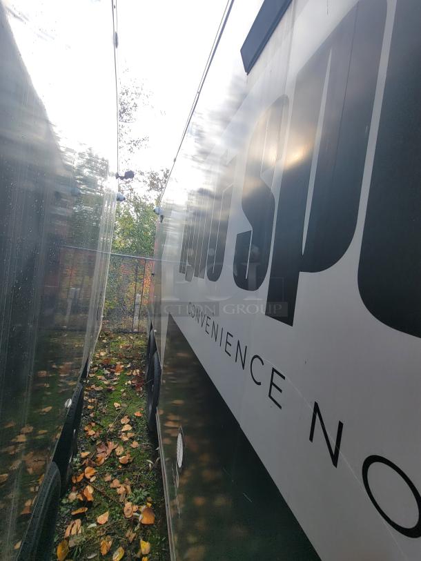 2021 SDG 20' mobile market trailer, exterior view, showcasing branding signage.