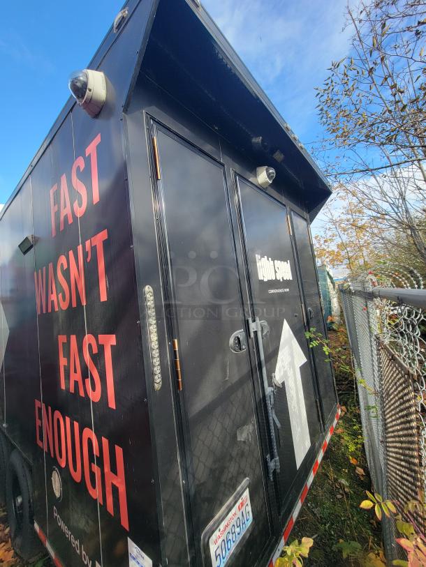 2021 SDG 20' Mobile Market Trailer, black exterior, "FAST WASN'T FAST ENOUGH" text, security cameras, robust condition.