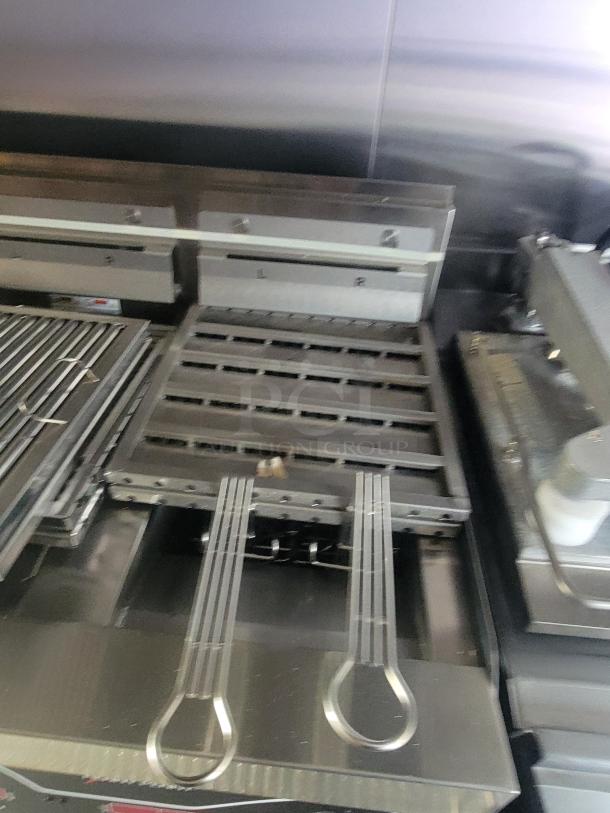 New Henny Penny fryer in 2022 Rock Solid Cargo ghost kitchen trailer, featuring top-tier commercial cooking equipment.