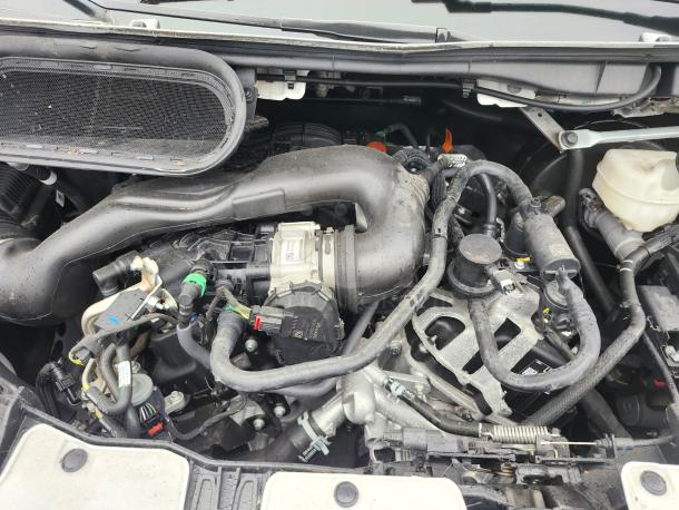 Engine bay of 2020 Ford Transit-350, showing 3.5L PFDI V6 engine components in clean condition.