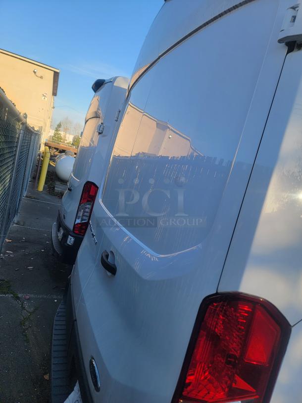 2020 Ford Transit-350 High Roof Extended Cargo Van, low mileage, backup camera, white exterior, commercial fleet configuration.