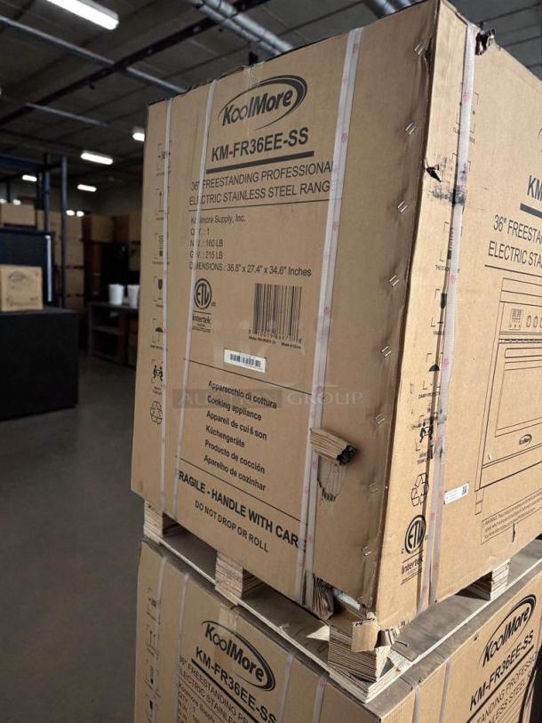 KoolMore 36" Professional Electric Range in box, Model KM-FR36EE-SS. Brand new, scratch & dent, fragile label visible.