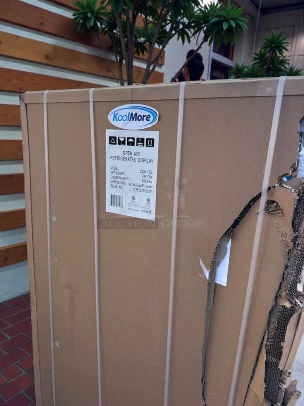 KoolMore CDA-13C Open Air Refrigerated Display, brand new, scratch & dent, original packaging, model label visible.