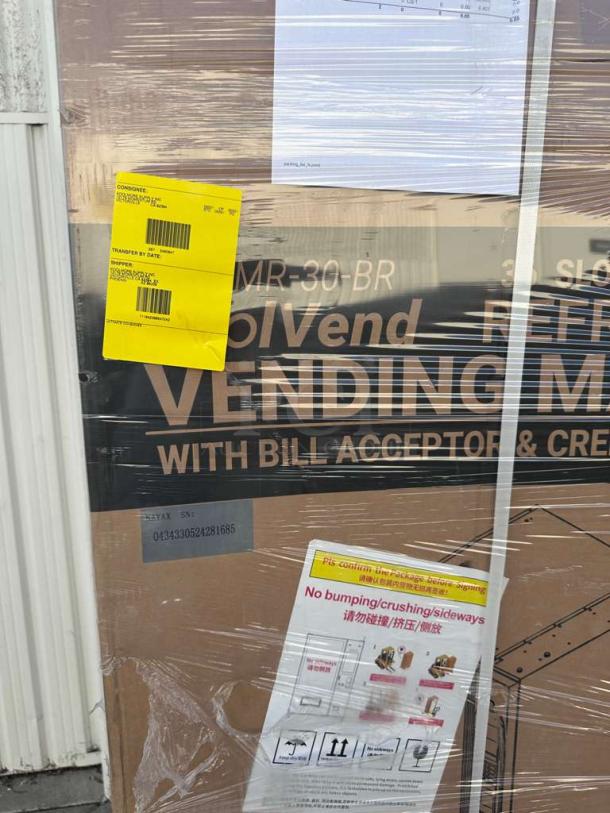 Brand New KoolMore Refrigerated Snack Vending Machine, model KM-VMR-30-BR. Includes bill acceptor and credit. Packaging visible.