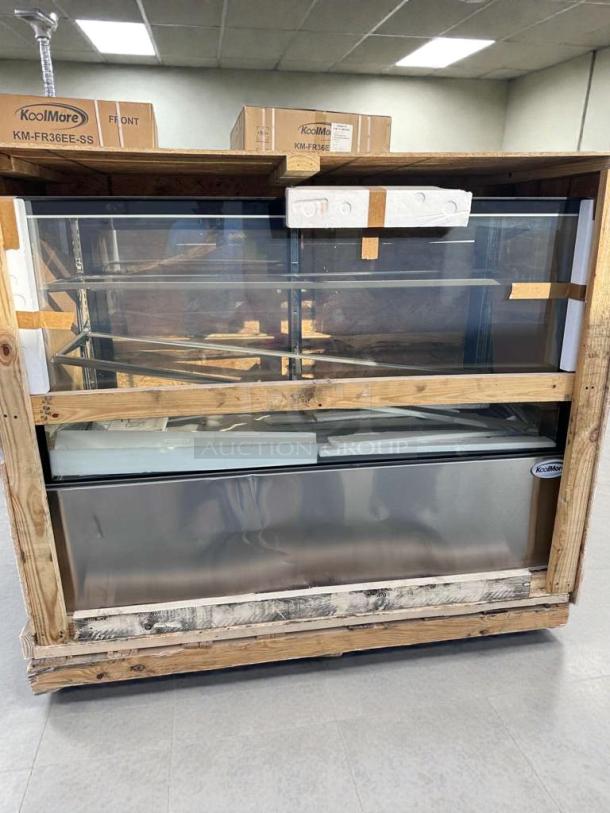 Brand new KoolMore refrigerated bakery display case, model KML-L-BDC-0031, in packaging, Scratch & Dent condition.