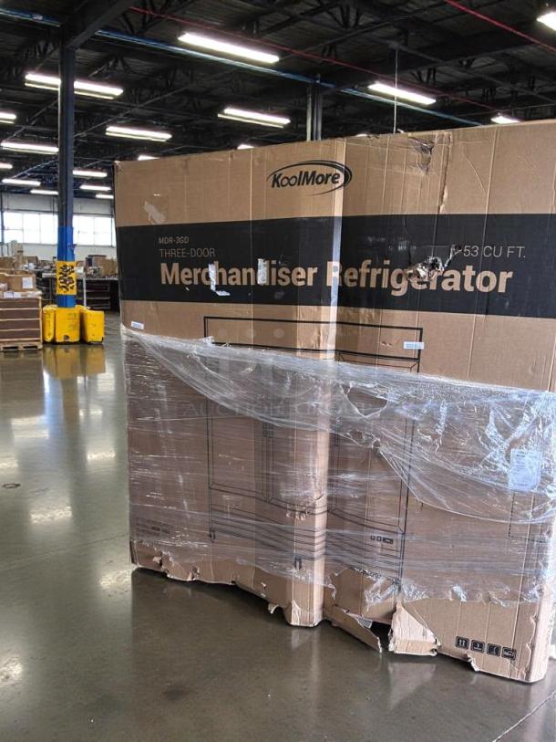 KoolMore MDR-3GD 3-Door Glass Merchandiser Refrigerator in original packaging. Scratch & Dent condition. 53 cu ft.