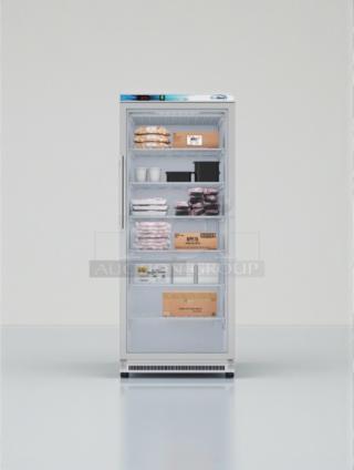 Brand new KoolMore KM-FMD20WGD commercial freezer with glass door, scratch & dent. Spacious interior with storage shelves.