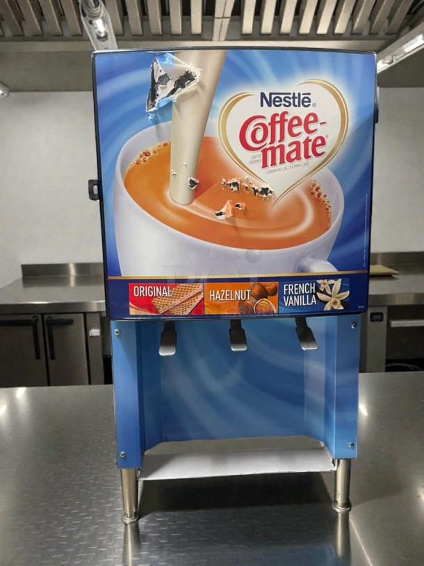 Silver King refrigerated cream dispenser, model SKNES2B/3B, excellent condition, 120V, single phase, tested and working.