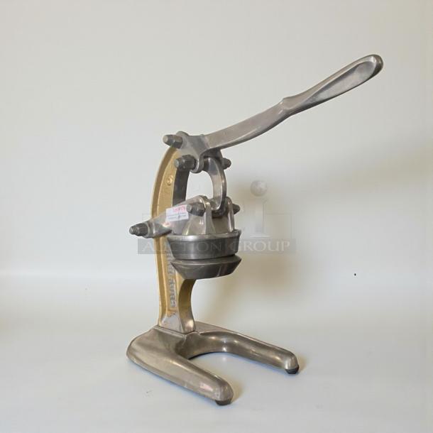 Like-new heavy-duty commercial manual citrus press, model MAN-S-PRS-0062, fully tested, in excellent condition.