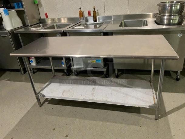 Stainless steel commercial prep table with undershelf in outstanding condition, heavy-duty construction by Commercial Stainless Steel Equipment.