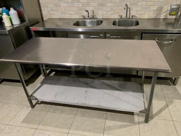 Stainless steel commercial prep table with undershelf in outstanding condition, by Commercial Stainless Steel Equipment.