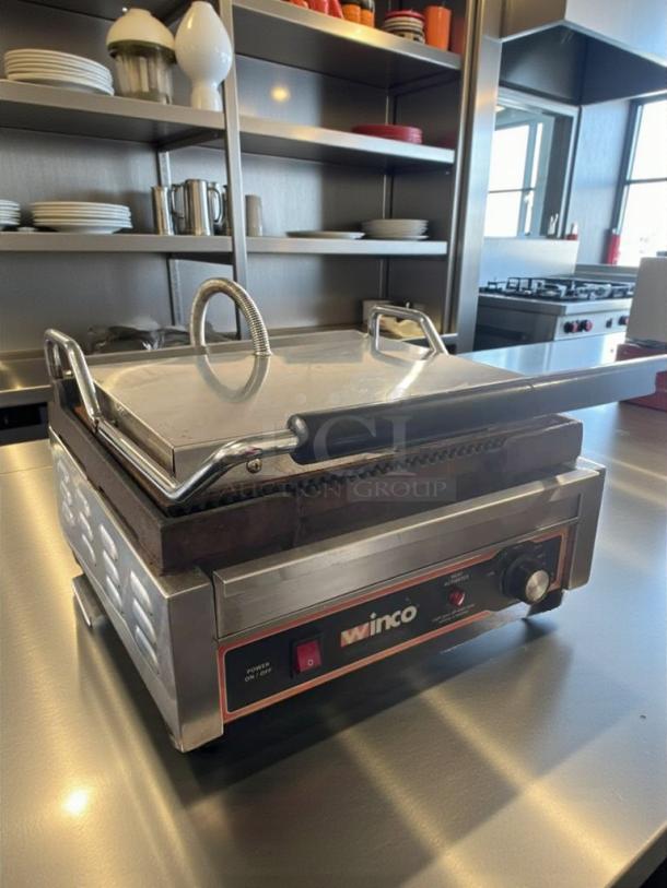 Winco EPG-1C Commercial Panini Grill in immaculate condition, stainless steel, single grill plate, 120V, tested working.