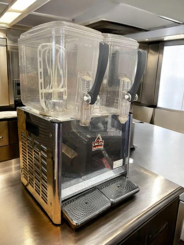 COMAI Cold Drink Dispenser, Model LYJ-JY/P12LX2, features 2 clear tanks; excellent condition, fully tested, 110V.