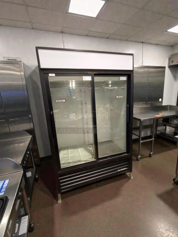 True GDM-45 Glass Door Merchandiser Refrigerator in immaculate condition, 115V, single phase, tested and working.