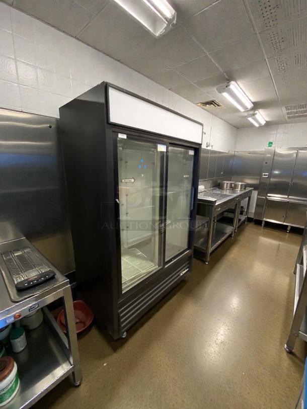 True GDM-45 Glass Door Merchandiser Refrigerator in immaculate condition. Features dual glass doors, 115V, tested and working.
