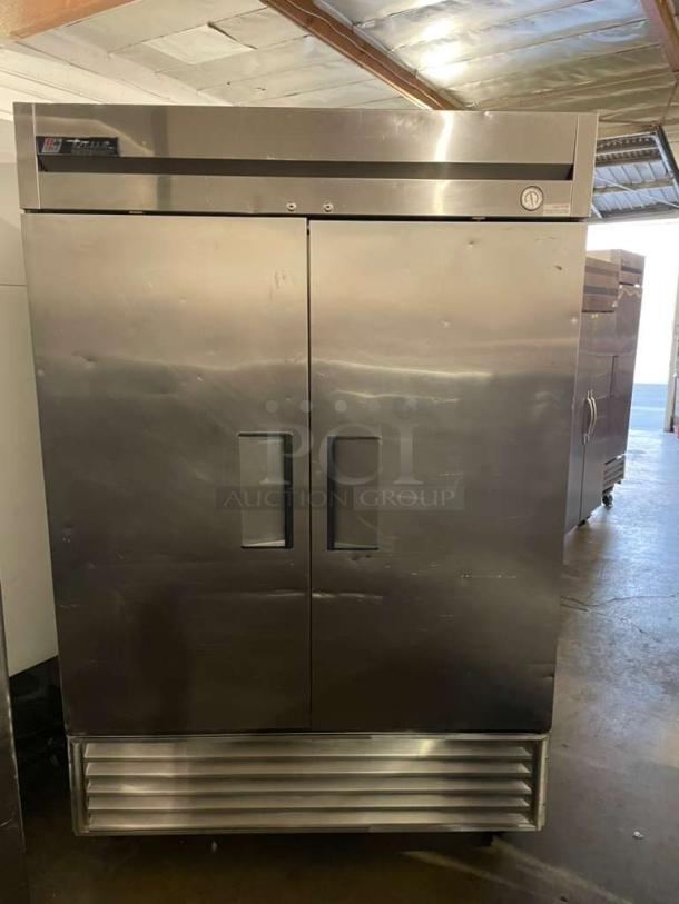 True T-49F Commercial Freezer, premium condition, dual doors, stainless steel, 115V, fully tested, True Manufacturing label.