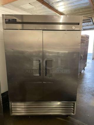 True T-49F Commercial Freezer, premium condition, dual doors, stainless steel, 115V, fully tested, True Manufacturing label.