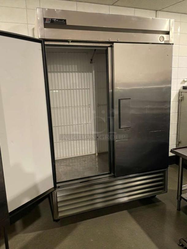 True T-49F commercial reach-in freezer, stainless steel, dual doors open, premium condition, fully tested, 115V/single phase.