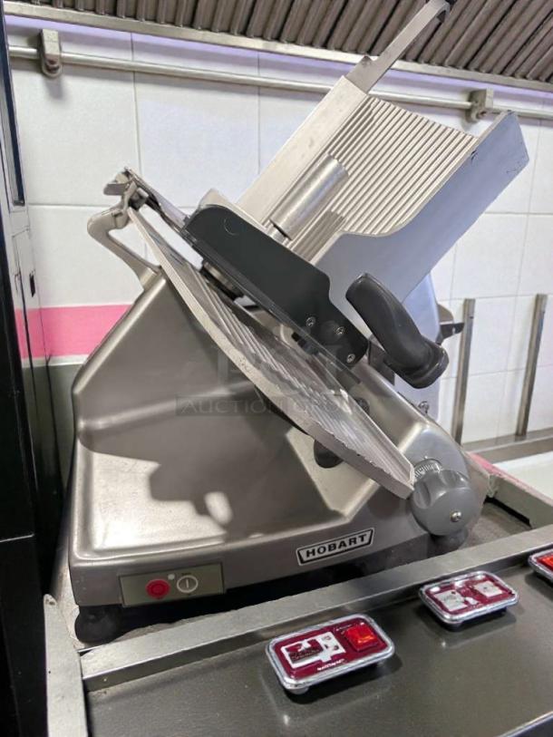 Hobart HS8 commercial meat slicer in high-grade condition, 120V, single-phase. Features durable construction and precise blade.