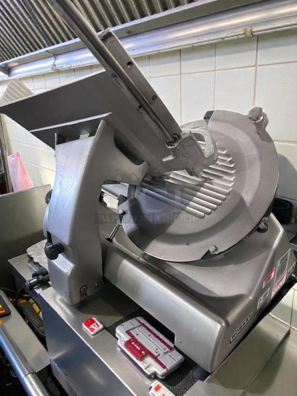 High-grade Hobart HS8 commercial meat slicer, 120V, single phase, excellent condition. Labels show model and specs.