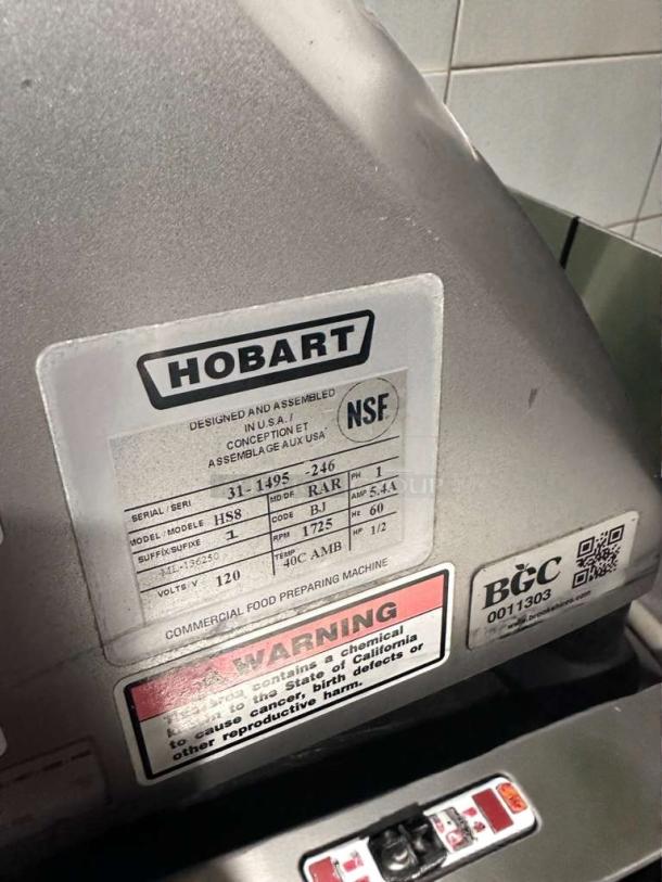 Hobart HS8 commercial meat slicer, high-grade condition, 120V, single phase, fully tested, label shows model and serial number.