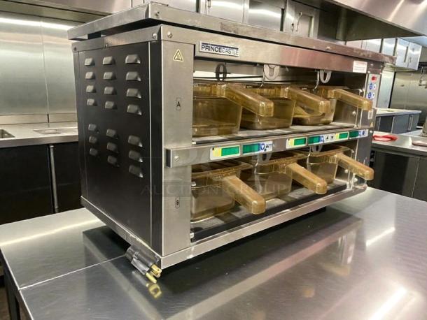 Prince Castle EHBP23 heated holding bin in pristine condition, stainless steel, with multiple compartments. Model and logo visible.
