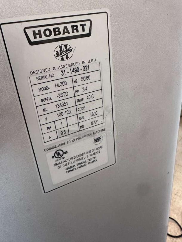 Hobart HL300 mixer label showing model, serial number, and specifications. UL and NSF listed for commercial use.
