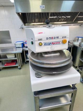 DoughXpress D-TXE-2-18W LV commercial dough press, excellent condition, 18" plates, 208-240V, fully operational, Made in USA.
