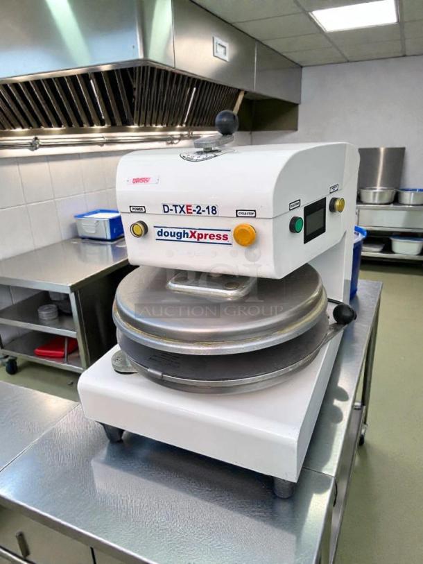DoughXpress D-TXE-2-18W LV dough press, excellent condition, 18" size, 208-240V, tested and operational, made in USA.