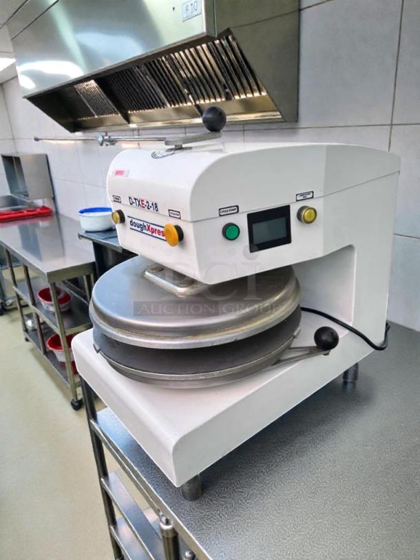 DoughXpress D-TXE-2-18W LV commercial dough press in excellent condition, 18-inch, 208-240V, made by HIX Corporation, USA.