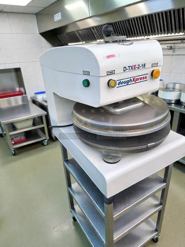 DoughXpress D-TXE-2-18W LV commercial dough press by HIX Corporation in excellent condition, 18" plate, fully operational.