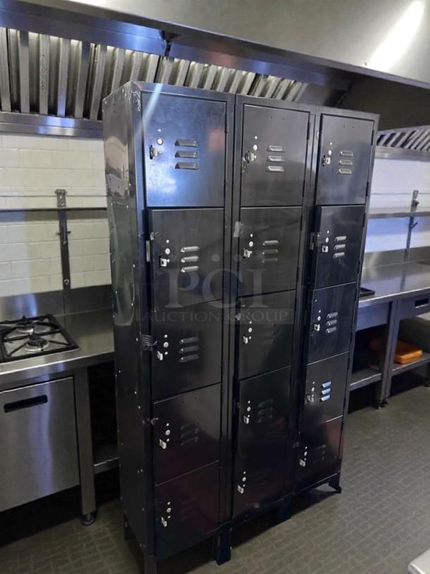 Industrial Steel 12-door locker cabinet in premium condition. Heavy-duty, USA-made, suitable for commercial or restaurant use.