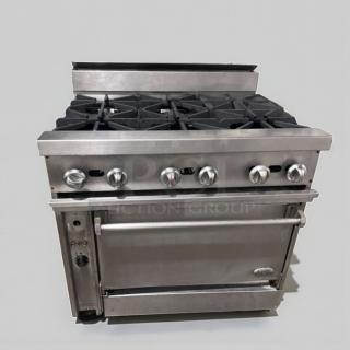 Commercial 6 burner gas range with oven, stainless steel, superior condition. Heavy duty, fully operational, model COM-L-RNG-0509.