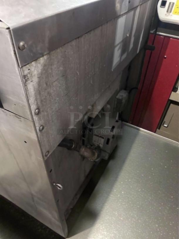 Commercial Restaurant Equipment 6 Burner Range with Oven Base in superior condition, stainless steel, fully operational.