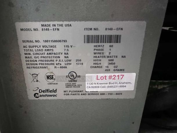 Delfield 8148-EFN label, 115V, NSF & UL listed, serial 1801150000793, refrigerant R-404A, Lot #217, Anaheim address.