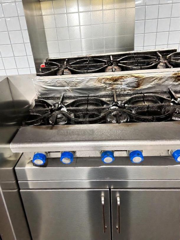 Imperial Range IHPA-6-36; 36” 6-burner commercial hot plate; excellent condition; fully tested; blue knobs; stainless steel.