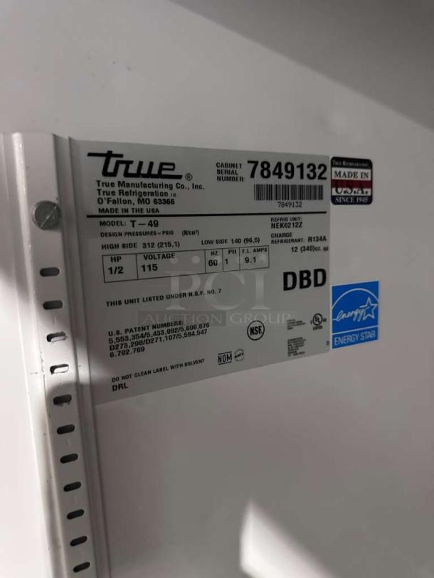 Alt text: True T-49 commercial refrigerator label, 49 Cu. Ft., UL & NSF listed, energy-efficient, made in the USA, fully tested.