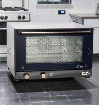 Cadco Lisa OV-013 commercial countertop convection oven, top-tier condition, with control knobs, and glass door; 208-240V, single phase.