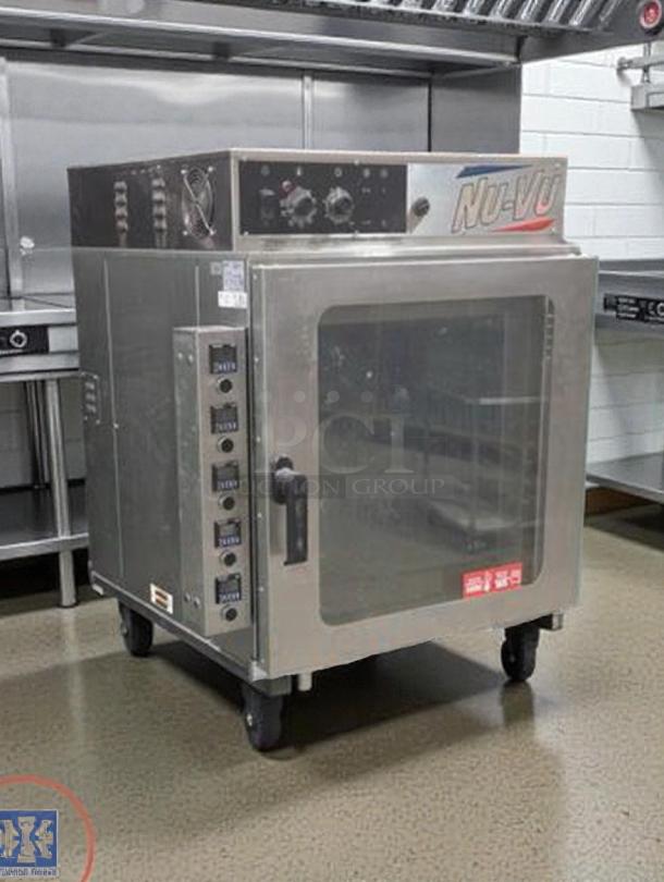 Nu-Vu RM-5T convection oven, outstanding condition, with mobile stand, 208V/3 Phase, stainless steel, fully tested and working.