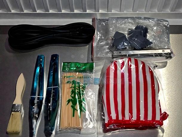 Accessories for Seeutek Hot Dog Roller Grill CZ-7: power cord, cleaning tools, skewers, striped mitt, and spare parts.