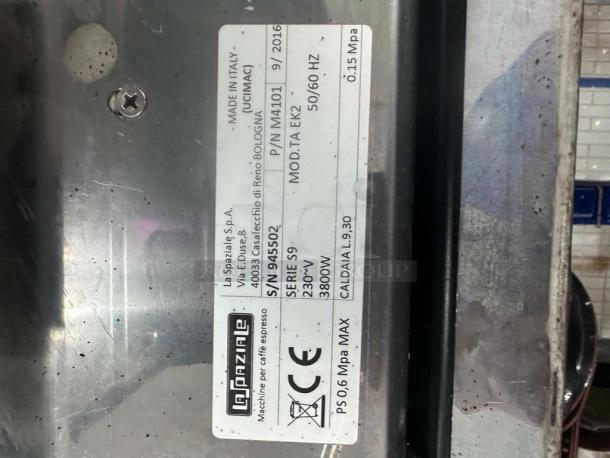 La Spaziale S9 EK2 espresso machine label, showing model, serial number 945502, 230V, 3800W specs. Made in Italy.