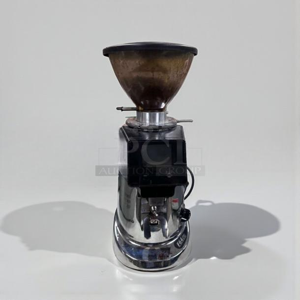 Fiorenzato F64E XGi espresso grinder, premium condition, electronic doser, ETL listed, fully tested, reflective chrome finish.