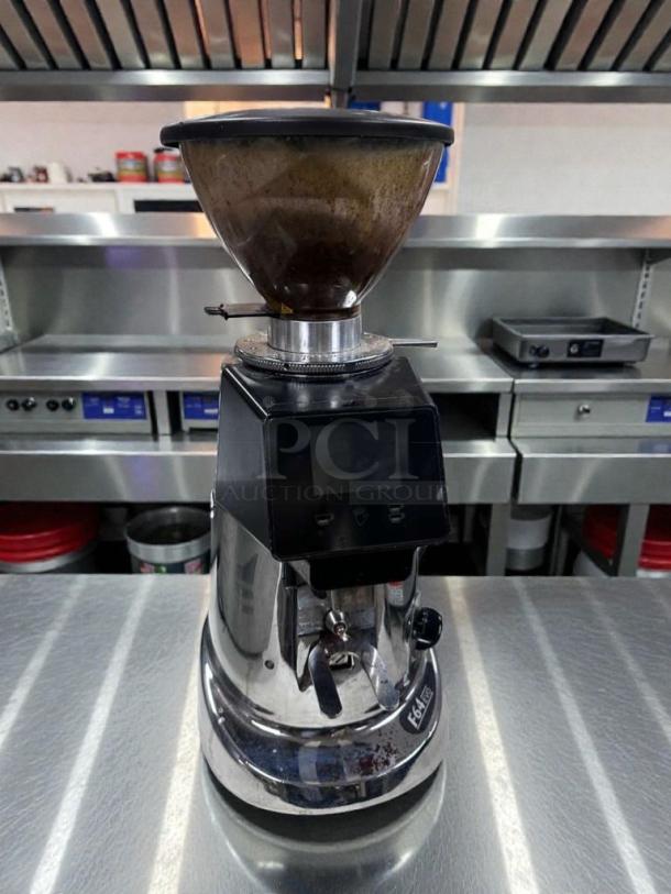 Fiorenzato F64E XGi Super Electronic grinder, premium condition, sleek chrome finish, touchscreen, ETL listed, fully tested.